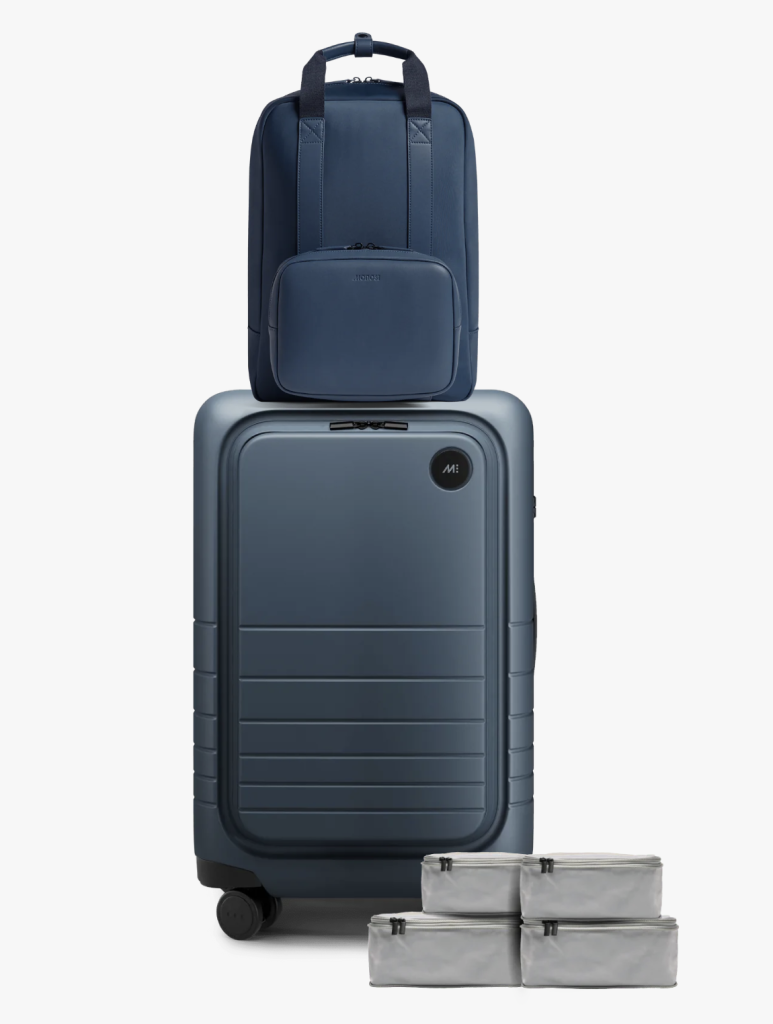 photo of blue Monos luggage set